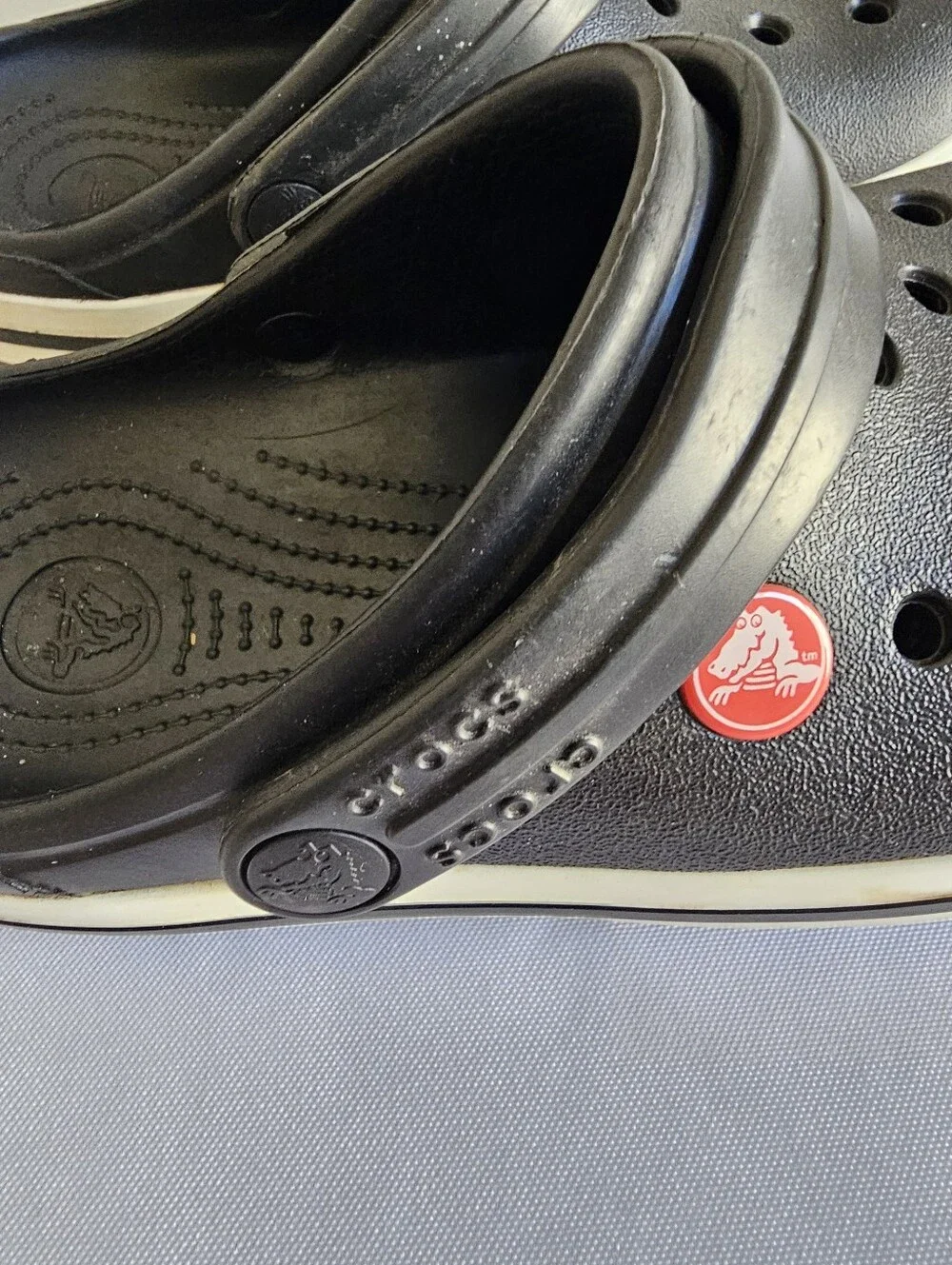 CROCS Kids Black Clogs with White Stripe